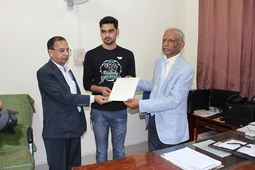 Prof A S K Sinha, Dean, Academic Affairs giving away KAF81 Scholarship Certificates to students on 24th February 2018